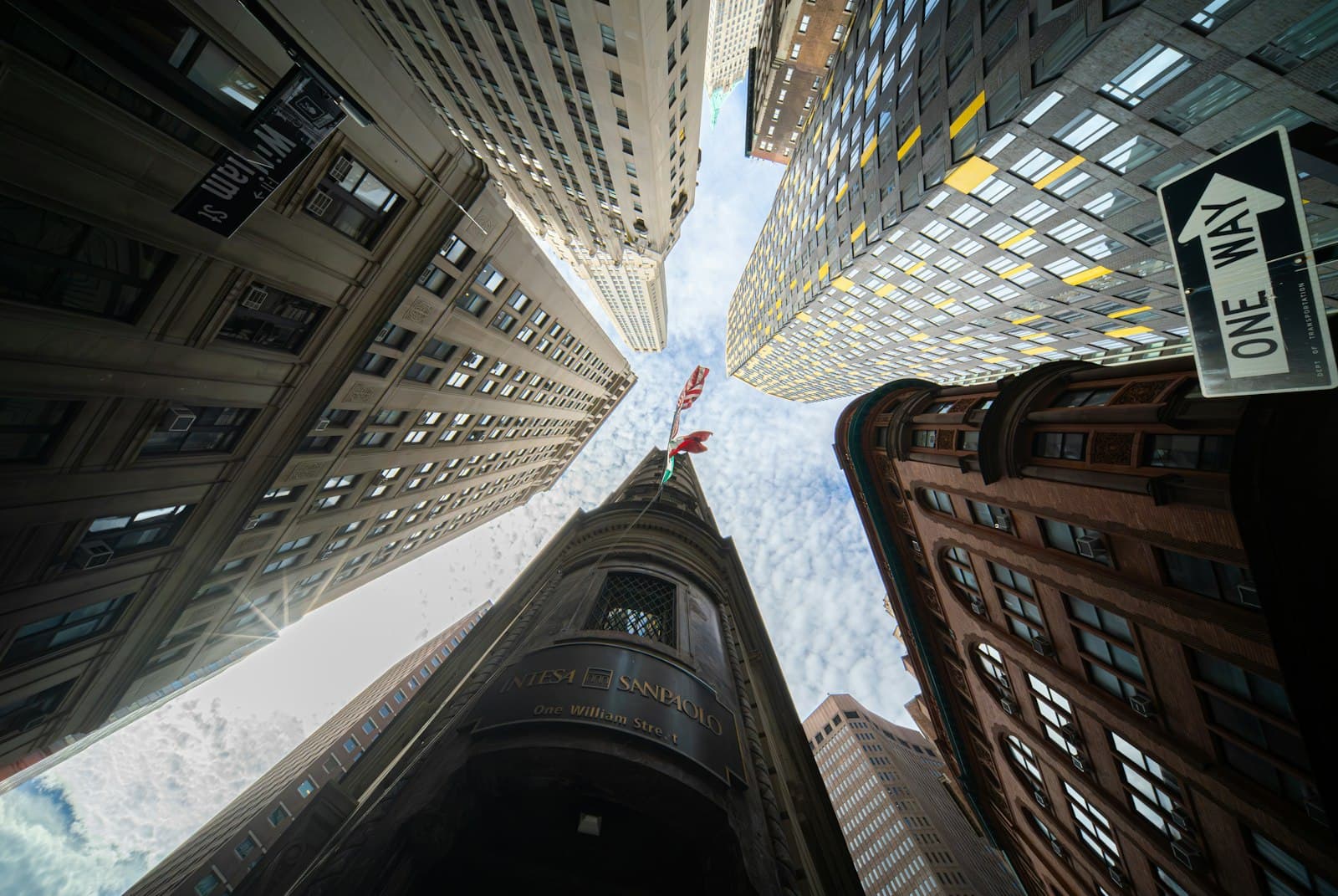 Looking up at tall buildings in a city