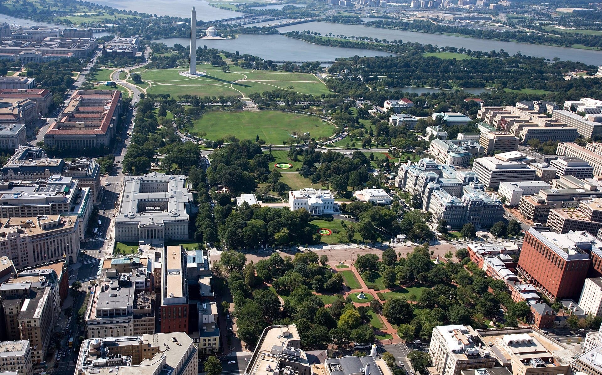 Aerial view of President's Park in Washington, D.C. encompassing Lafayette Square (foreground) , the White House , and the Ellipse (background) .