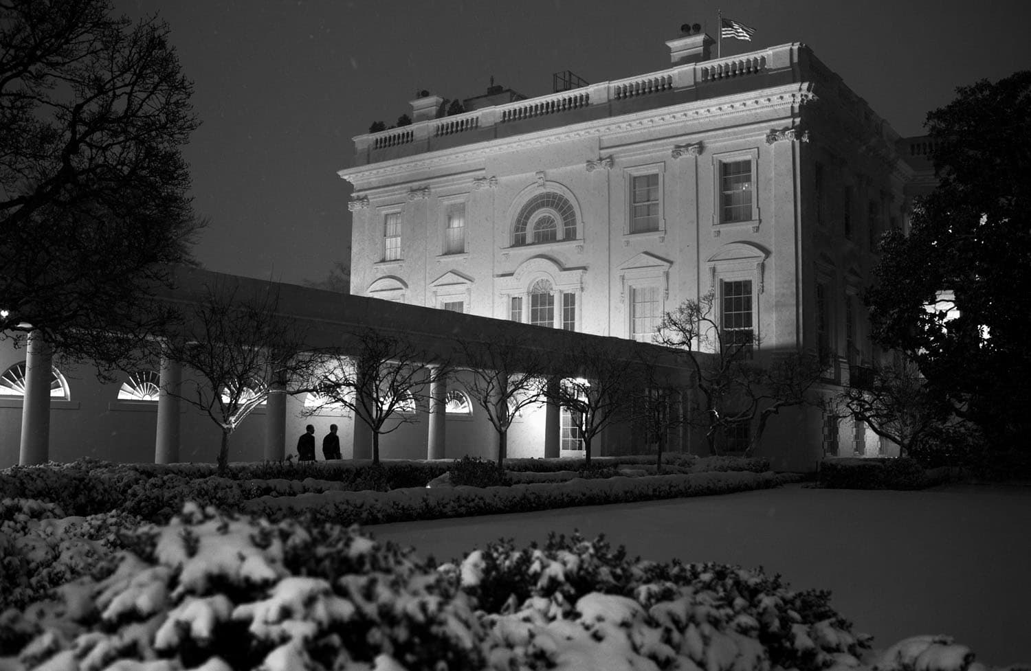 Jan. 21, 2014 "A blanket of snow in the Rose Garden made for an interesting foreground as the President walked along the White House Colonnade to the residence at the end of his da